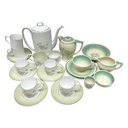  Susie Cooper Dresden Sprays pattern breakfast set, including coffee pot, sugar bowl, milk jug, egg cup, teacup trio and bowl, together with a Susie Cooper Wild Rose pattern coffee service for six