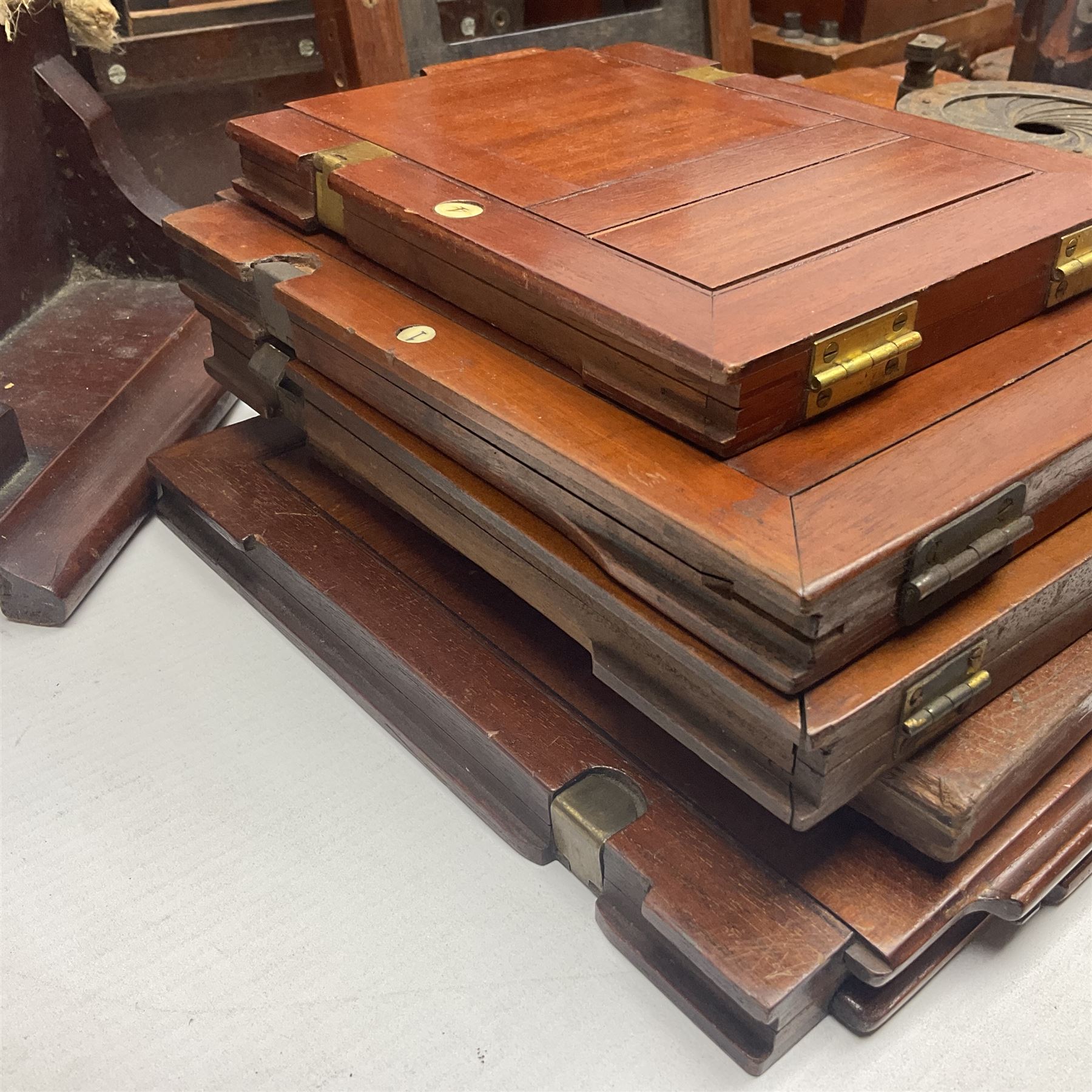 Collation of folding plate cameras of various sizes folding plate in mahogany and lacquered brass, together with camera plates and slides
By vendors repute some slide are from the Gandolfi workshop