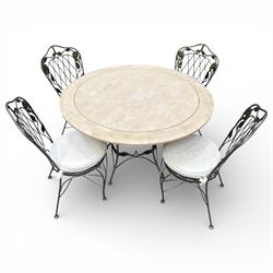Wrought iron garden dining table with leaf decoration, and set of four matching chairs