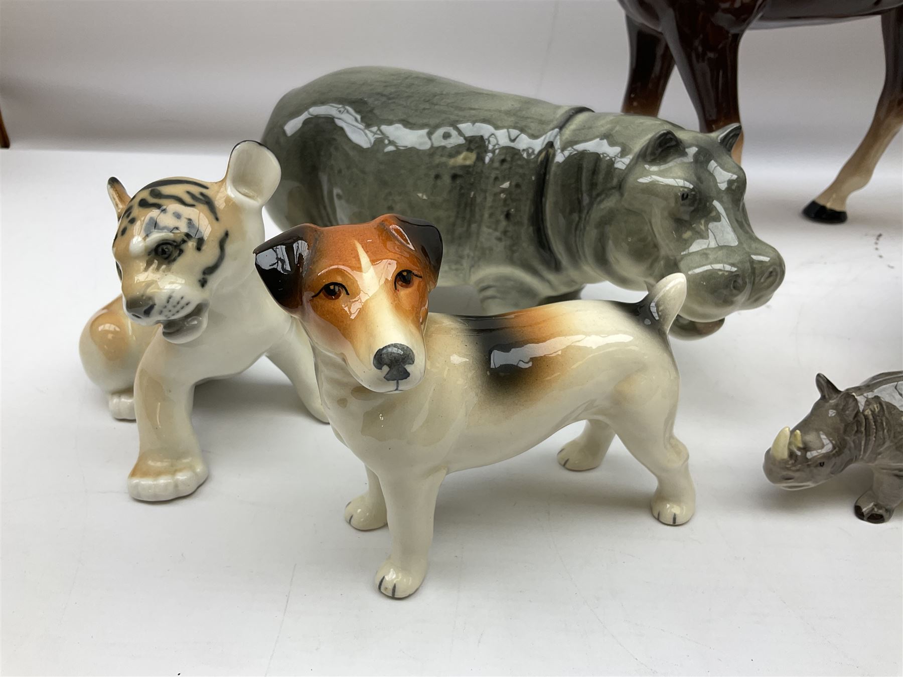 Beswick model of a seated bulldog, model no. 1872, Beswick Laurel & Hardy cruet set on stand, no. 575, Melba Ware animal figures to include large horse, hippo, rhino, USSR tiger cub figure, other ceramics to include Mason's lidded jar etc