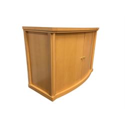Beech bow-front sideboard, fitted with two cupboard doors enclosing two shelves