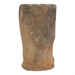 Sandstone carving, modelled as a stylised anthropomorphic head with simple facial features, H30cm