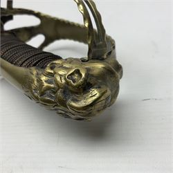 Late 18th century French 1st Empire Troupe a Pied Petit Montmorency Branch Tournante officer's sword, with 72.5cm slightly curving fullered blade, pierced brass hilt with lockable swivelling bar, fully wire-bound grip with lion head pommel, L88cm overall (no scabbard)