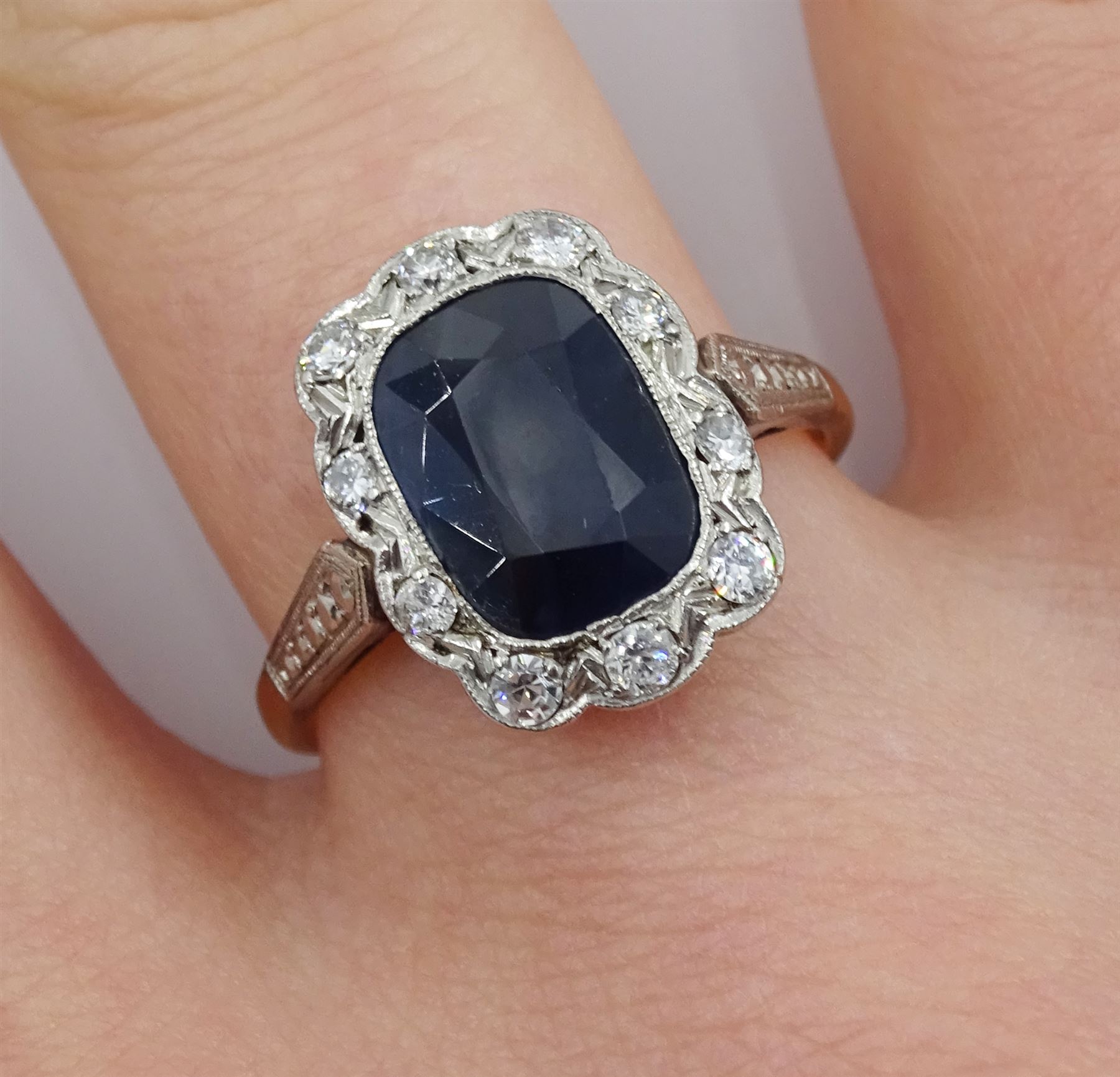 Art Deco style gold rectangular cushion cut sapphire and diamond