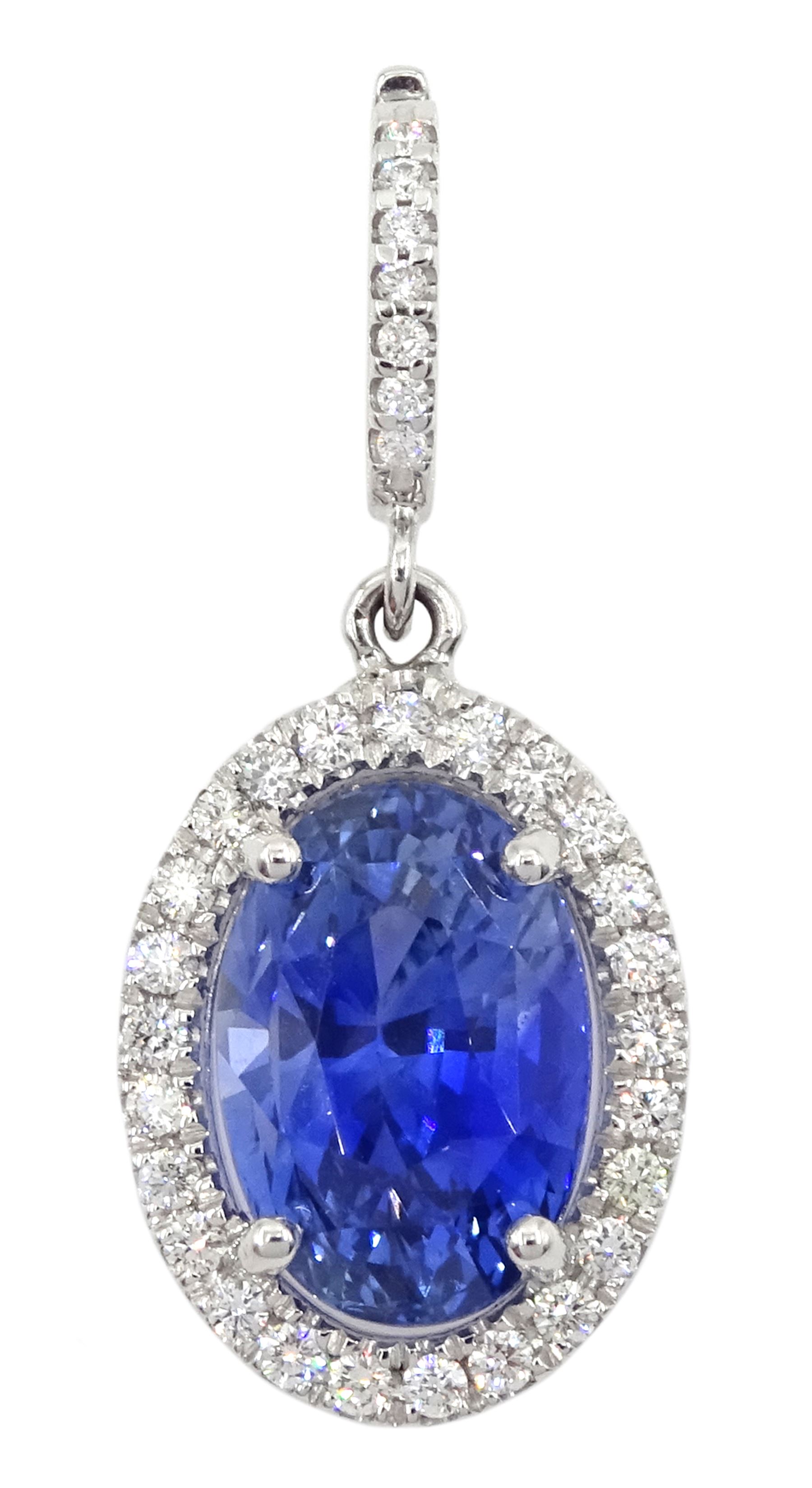 18ct white gold oval Ceylon sapphire and diamond pendant, stamped 750, sapphire approx 7.20 carat