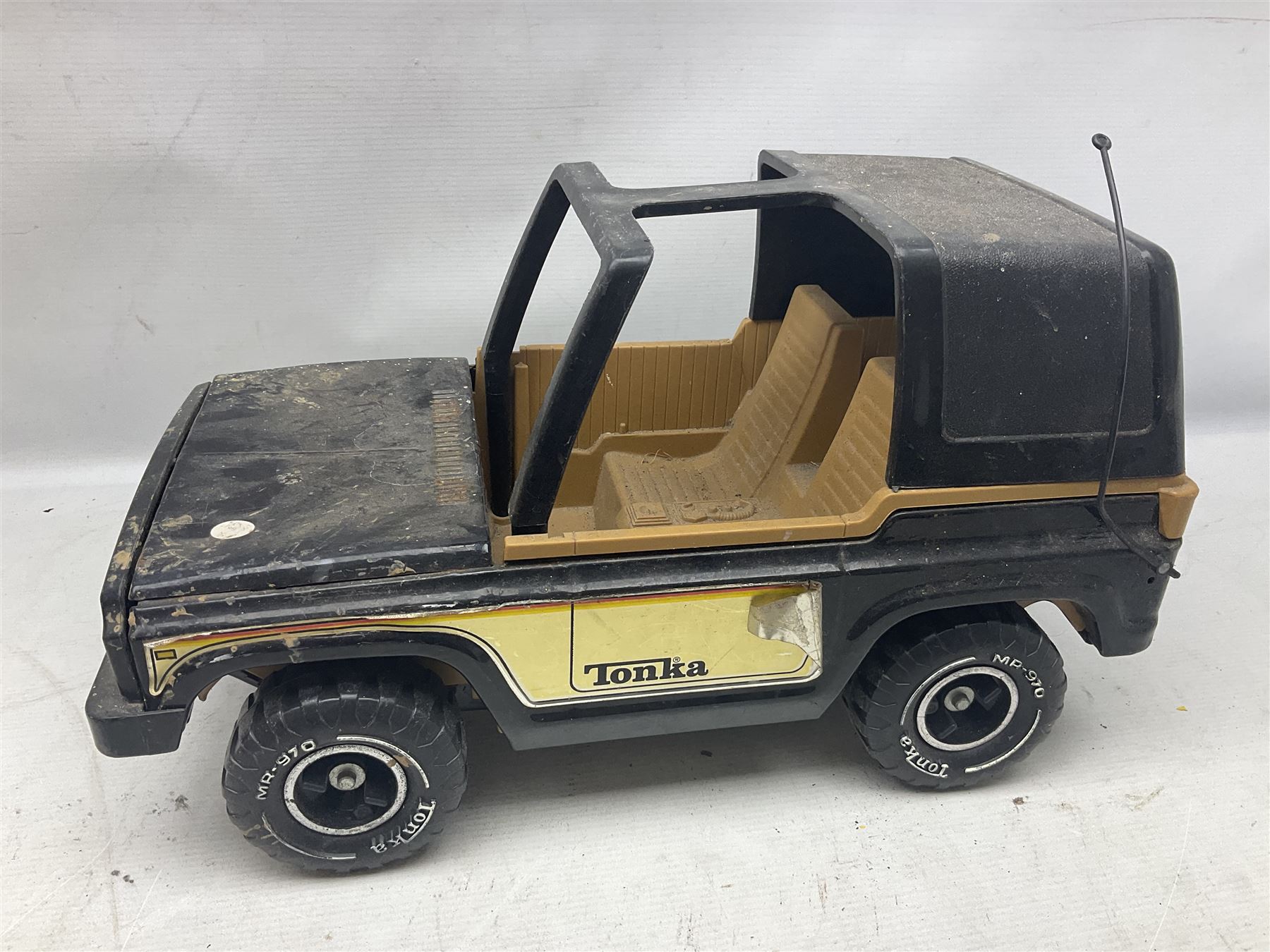 Tonka - five large scale pressed steel vehicles comprising Cement Mixer, Mighty Mobile Crane, Jeep and two Dumper Trucks (5)