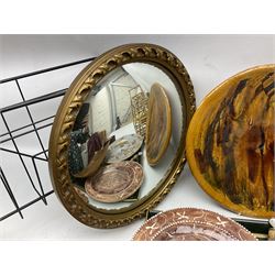 Convex mirror, with gilt foliate frame, together with terracotta bust depicting Bacchus, treacle glazed terracotta plate depicting birds, and other collectables 
