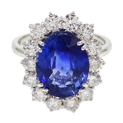  18ct white gold oval sapphire and diamond cluster ring, sapphire approx 5.7 carat, diamonds approx 1.3 carat  