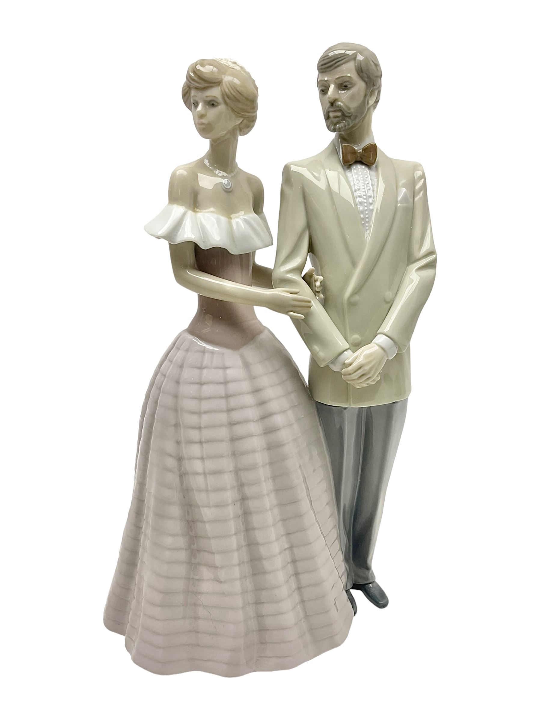 Lladro figure, An Evening Out, modelled as a man and women in evening dress, no 5540, year issued 1988, year retired 1991, H32cm