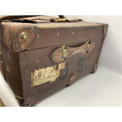Early 20th century two-handled leather-mounted travelling trunk of large proportions and with re-enforced wood slatted underside, L98cm, together with a twin handled black metal document box