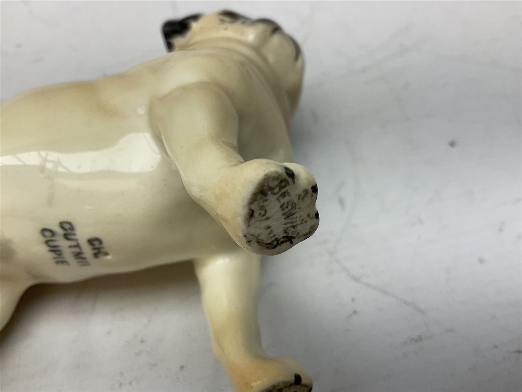 Three Beswick models comprising Hereford Bull no 949, 'CH Cutmil Cupie' Pug, and bay Shire horse, all with printed marks beneath