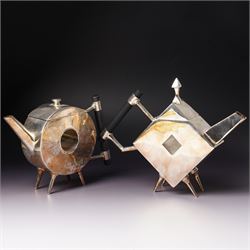 Manner of Christopher Dresser (1834-1904) - two art deco design silver plated teapots, of ...