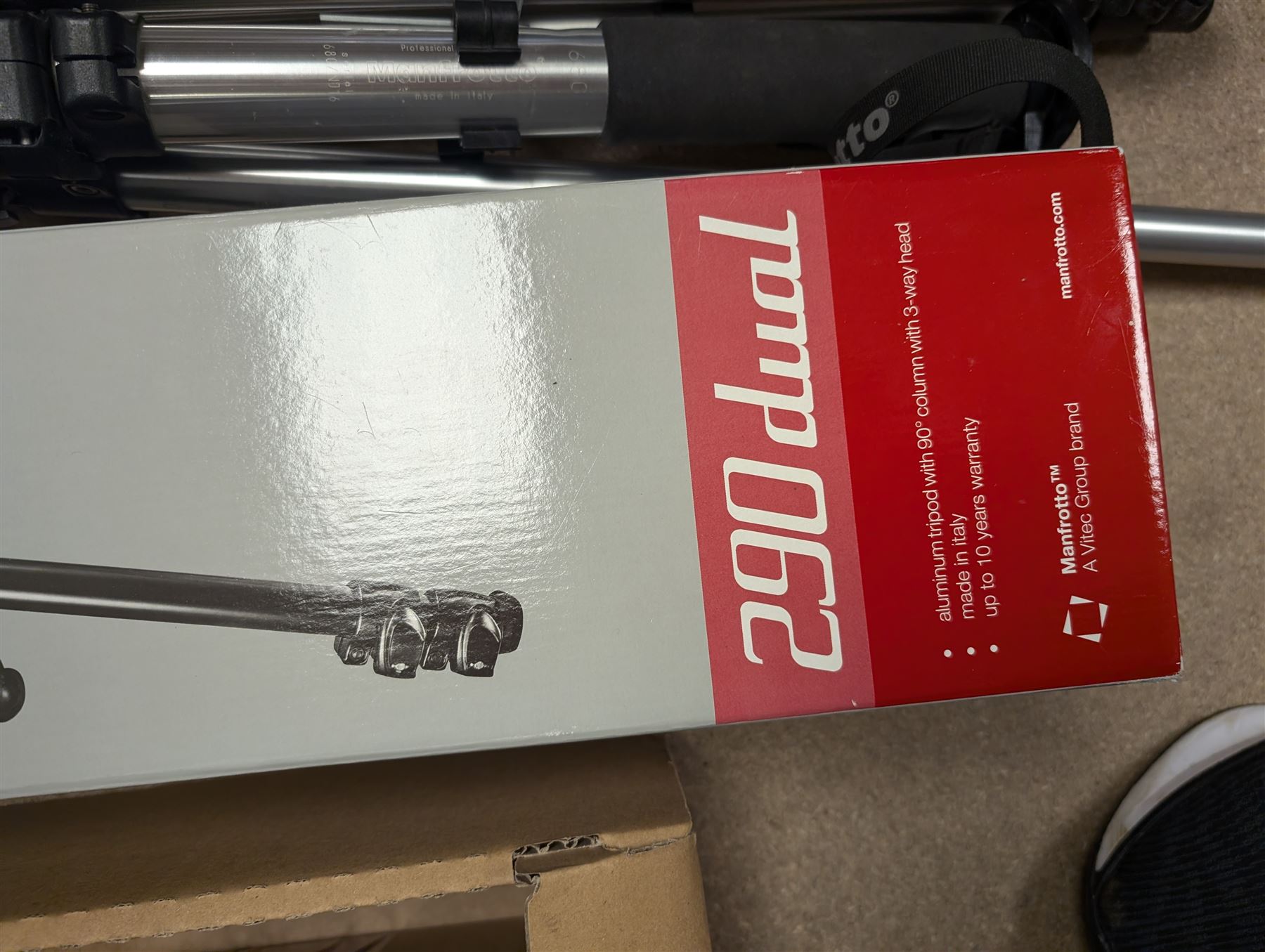 Camera equipment and accessories, including a boxed Manfrotto 290 dual tripods, two other tripods, four Tamron lenses and a collection of filters