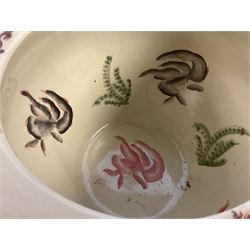 20th century Oriental fish bowl jardinière, decorated with reserves of birds amongst flowers, on wooden stand, fish bowl H29cm D36.5cm, together with another smaller example 