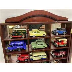 Collection of die-cast vehicles to include Corgi, Dinky, Lledo and Days Gone, housed in six wood display units