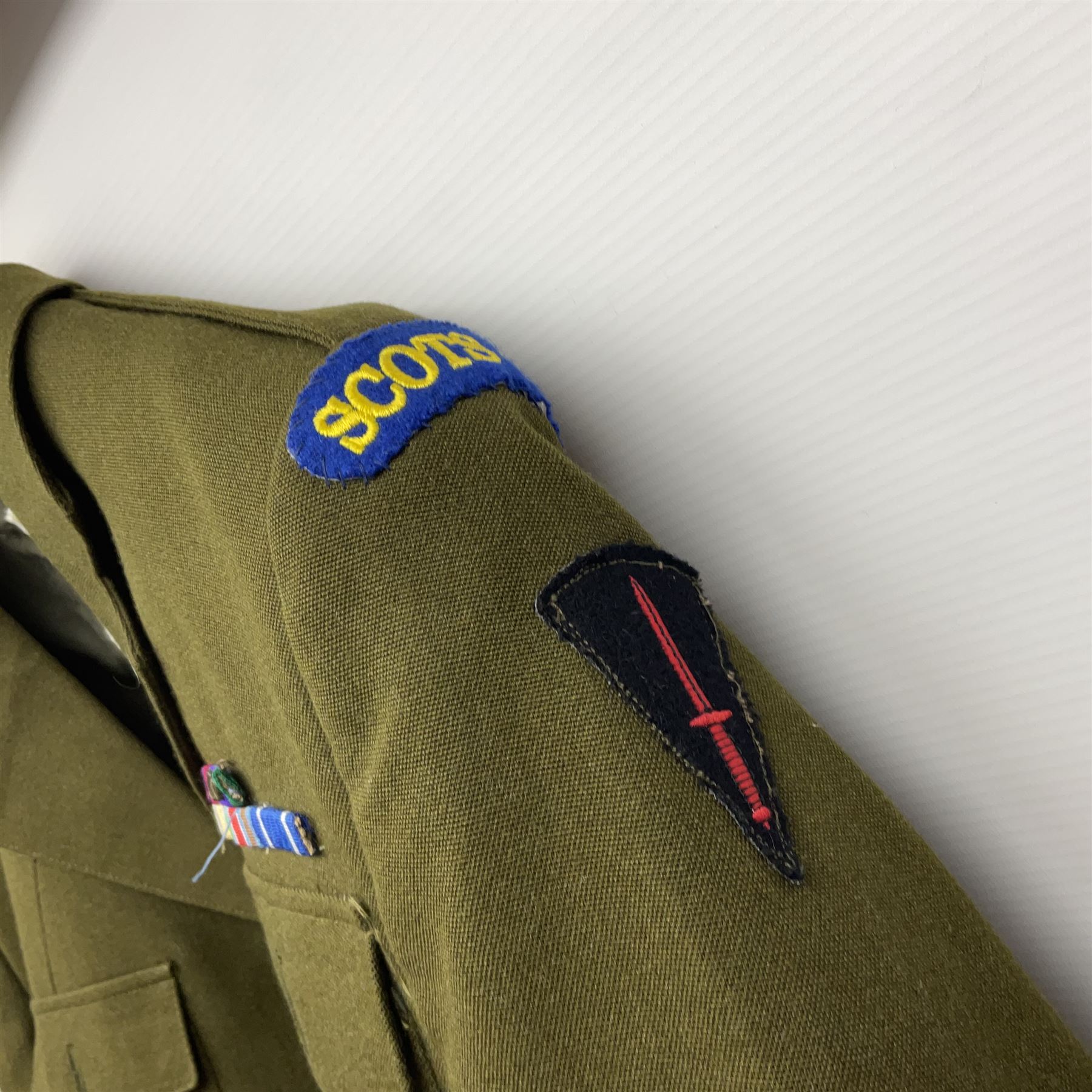 Two post-WWII British Army No.2 Dress tunics, one with Green Howards buttons; army shirt dated 1951; Royal Fleet Auxilliary jacket with trousers; three RAF/WAAF uniforms and RAF Greatcoat; and three canvas/webbing bags, two dated 1943 & 1945