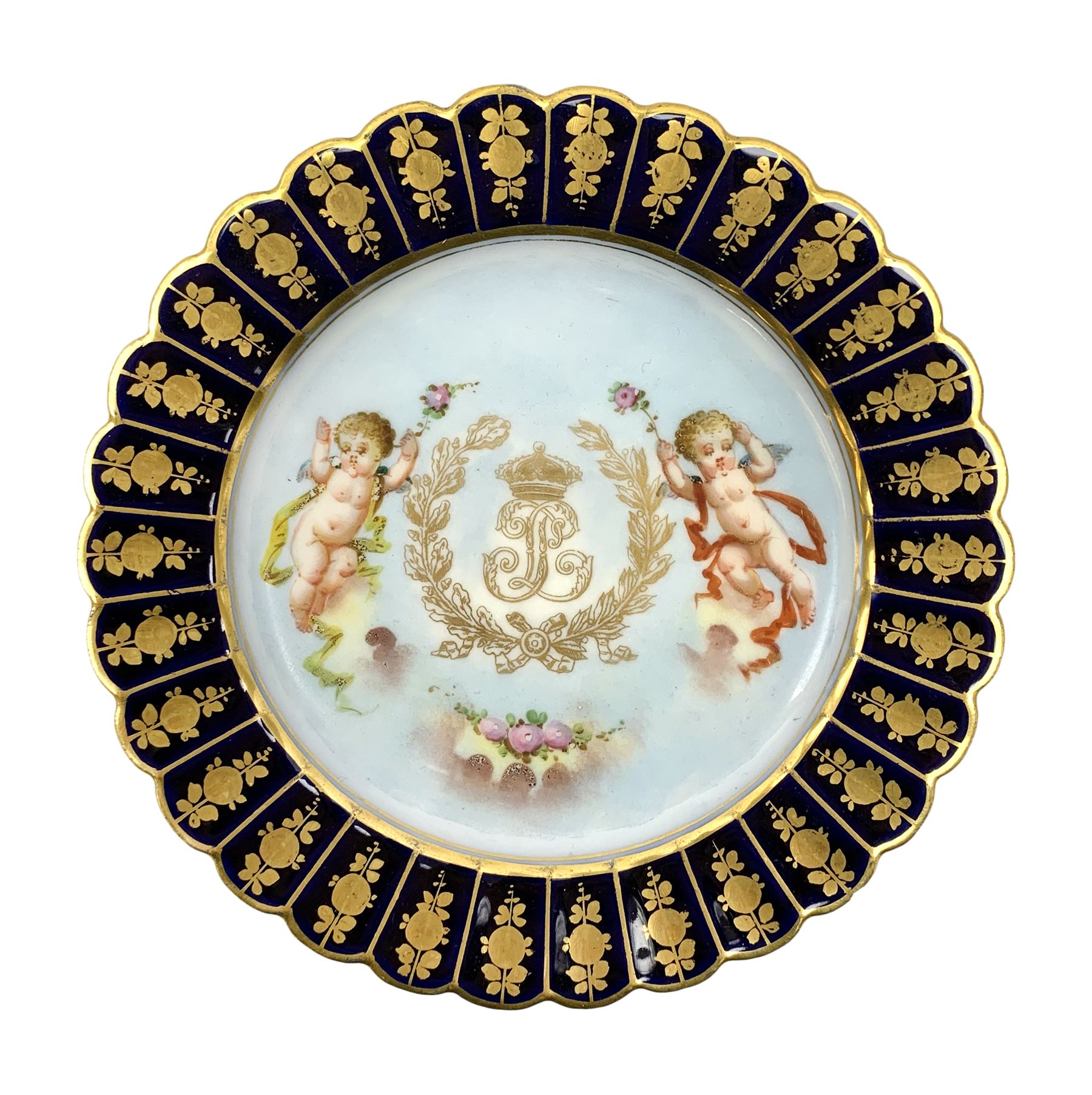Mid 19th century Sevres Louis Philippe period porcelain cabinet plate, decorated with central Louis Philippe crowned monogram flanked by two cherubs, within cobalt gilt detailed border, with date mark for 1846, red inventory mark for Chateau des Tuileries, and blue monogram mark , D14.5cm