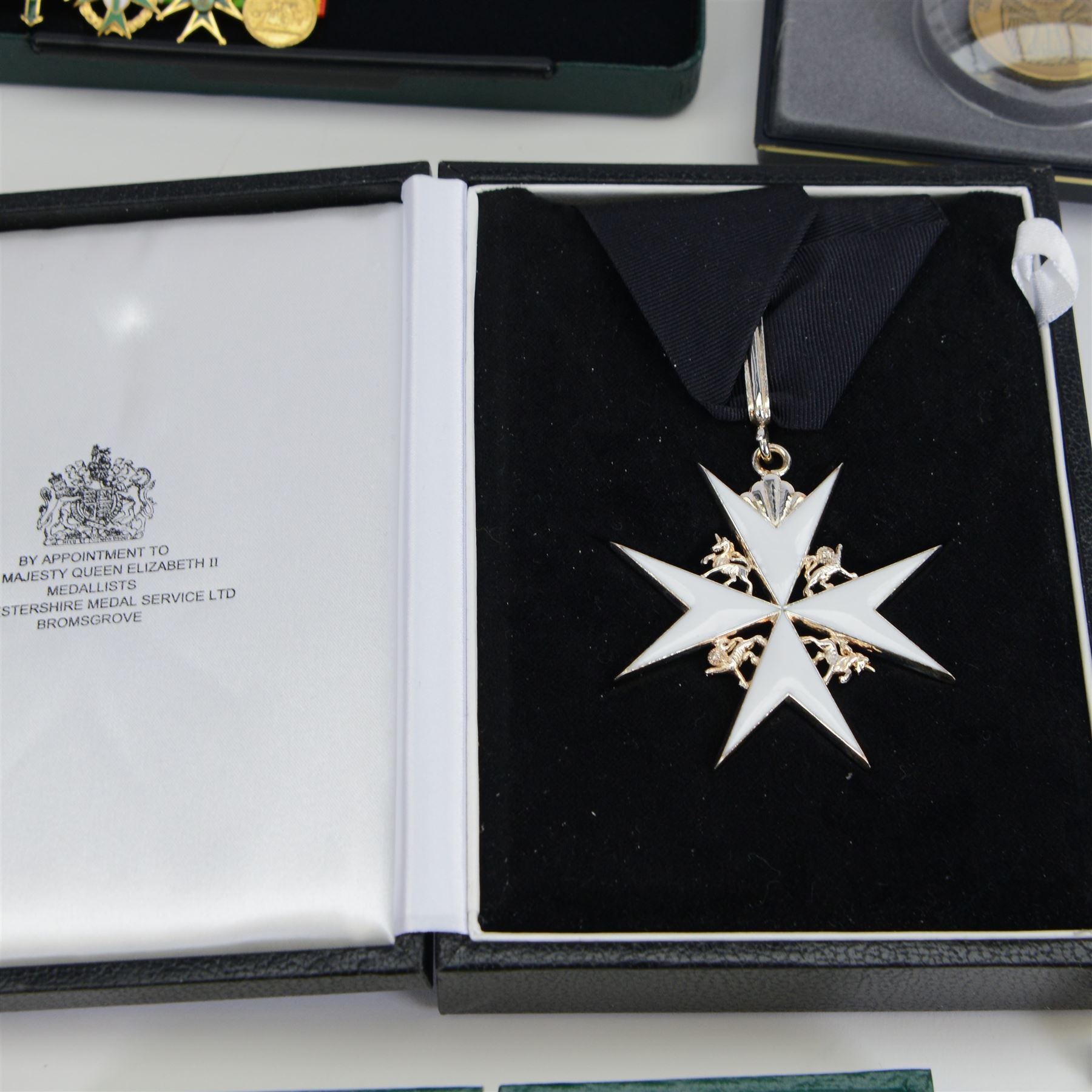 Collection of medals, insignias and minitures, including American National Defence medals, Efficiency Decoration medal, Order of St. John of Jerusalem stars, Military and Hospitaller Order of St. Lazarus of Jerusalem medals etc, several by Toye, Kedding & Spencer Ltd and Worcestershire Medal Service Ltd