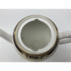 Wedgwood Cornucopia coffee service for six, comprising coffee pot, milk jug, twin handled covered sucrier, coffee cans and saucers