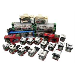 Eddie Stobart - three Oxford Die-Cast Super Rugby League lorries in perspex display cases including the two Hull Clubs; two Lledo Vanguard vans; two Days Gone vans; and Saico Truck & Trailer; all boxed; together with fourteen unboxed Corgi and other tractor/cab units etc (23)