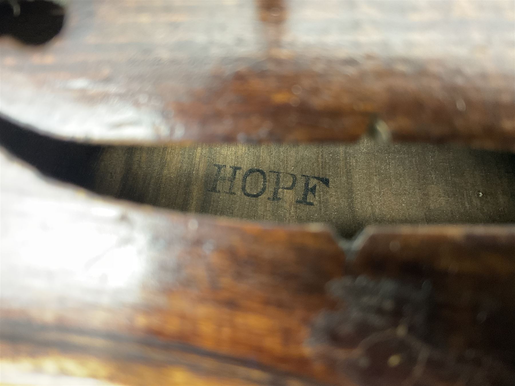 German Hopf violin c1900 with 35.5cm two-piece maple back impressed HOPF, maple ribs and spruce top, also marked HOPF internally L58.5cm overall; in Maidstone ebonised wooden coffin case with bow
