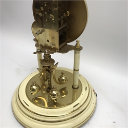 Late 20th century Kundo anniversary clock, Arabic dial, cream painted and decorated with flowers and another late 20th century anniversary clock with black dial, both under glass domes