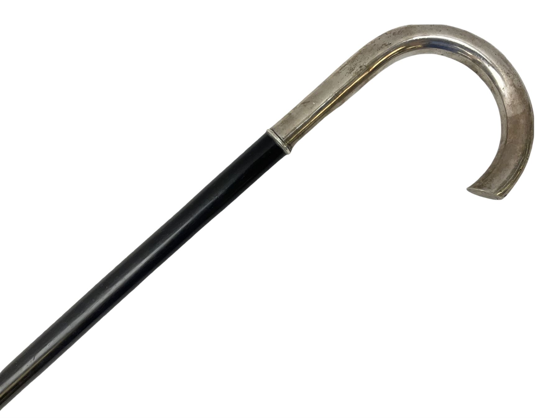 Continental silver handled walking cane, unmarked but testing around 800 standard, with engraved monogram to terminal, upon an ebonised cane, approximately H91.5cm