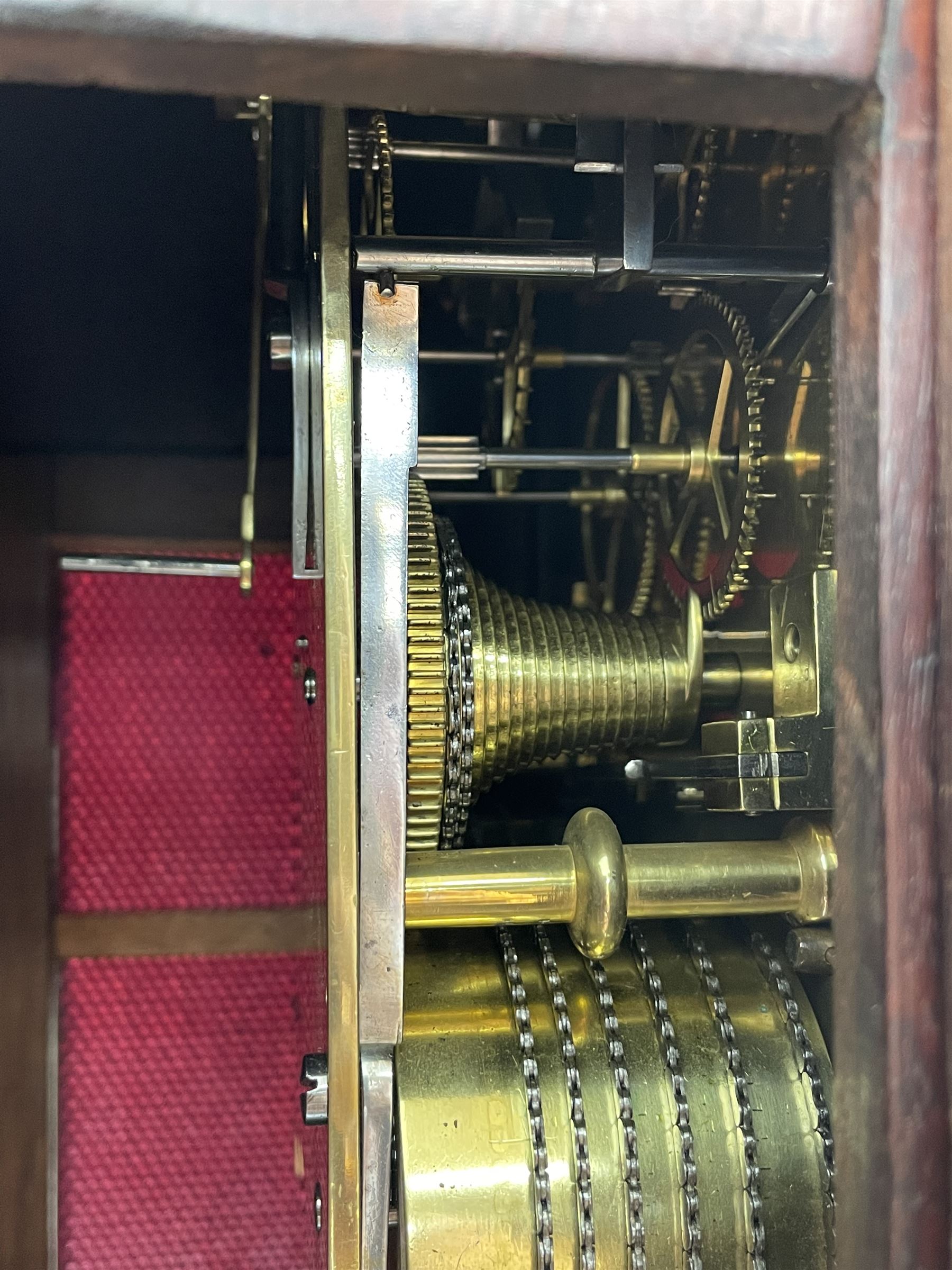 Frodsham of London - 8-day chain driven twin fusee wall clock in a mahogany case c1870, veneered case inlaid with brass stringing and motifs, shaped earpieces and chisel shaped base with pendulum adjustment door, 10” painted steel dial with Roman numerals, minute track and blued serpentine steel hands, dial inscribed Frodsham, Gracechurch Street, London, chain fusee, five-pillar, rack striking movement striking the hours on a cast bell. With pendulum.
H65 W34 D18
George Edward Frodsham, son of John Frodsham is recorded as working in Gracechurch Street, London 1869-79. Succeeded to Frodsham & Baker
