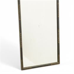 Black lacquered and Chinoiserie wall mirror, the shaped pediment decorated with pagoda in landscape with two figures, plain mirror plate enclosed by moulded surround