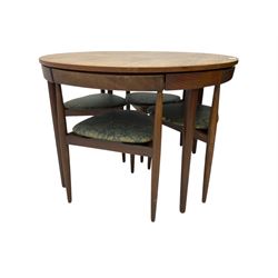 Hans Olsen for Frem Røjle - mid-20th century Danish teak 'Roundette' dining set, comprising a circular dining table raised on four tapering supports, paired with four matching chairs, each with a triangular seat upholstered in floral patterned fabric and raised on three tapering supports