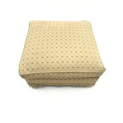 Square footstool upholstered in pale patterned fabric 