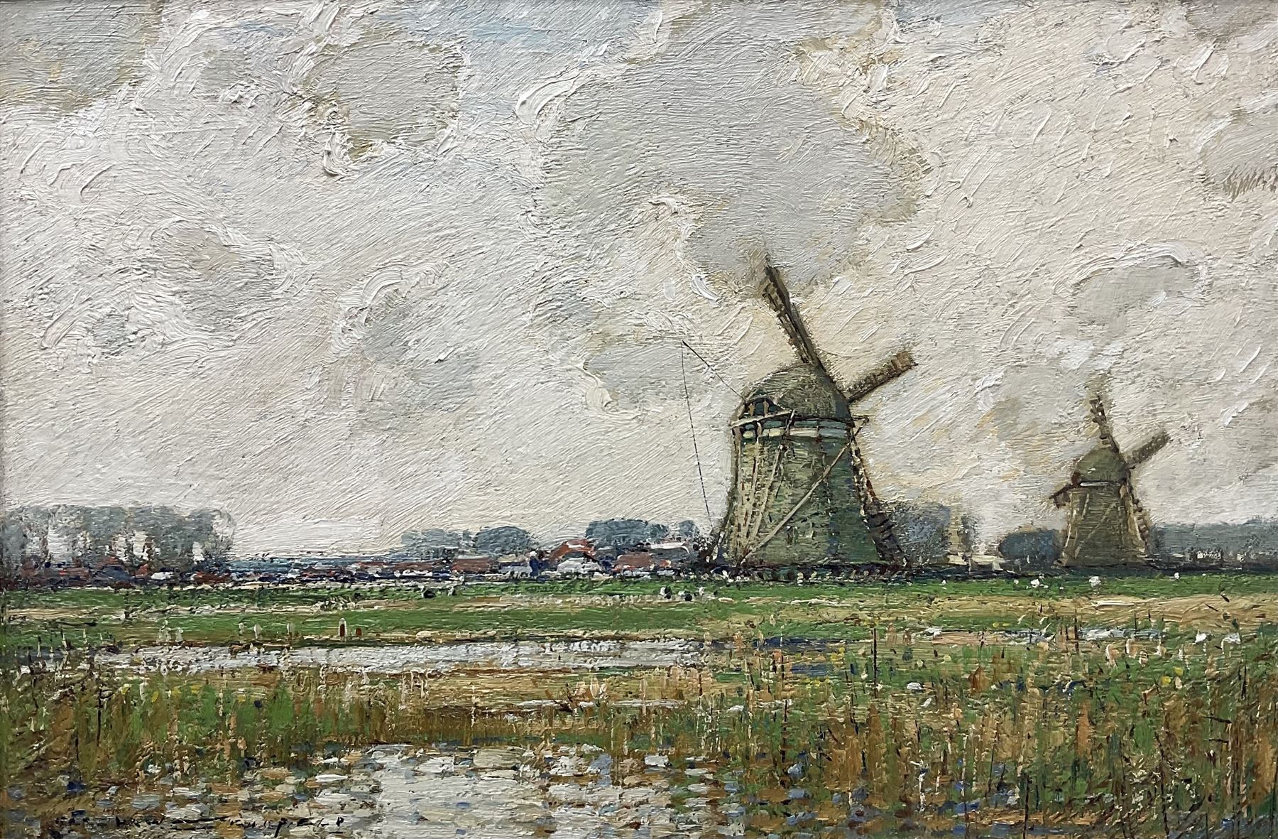 Kershaw Schofield (British 1872-1941): Dutch Landscape with Windmills beyond a Reedy Pond, oil on panel signed 34cm x 51cm