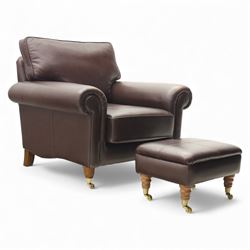 Laura Ashley - brown leather armchair and foot stool, loose cushion back and seat, flanked...