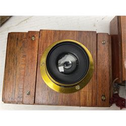 Sands Hunter & Co Ltd folding 1/4 plate camera in mahogany and lacquered brass, with two lenses and leather case