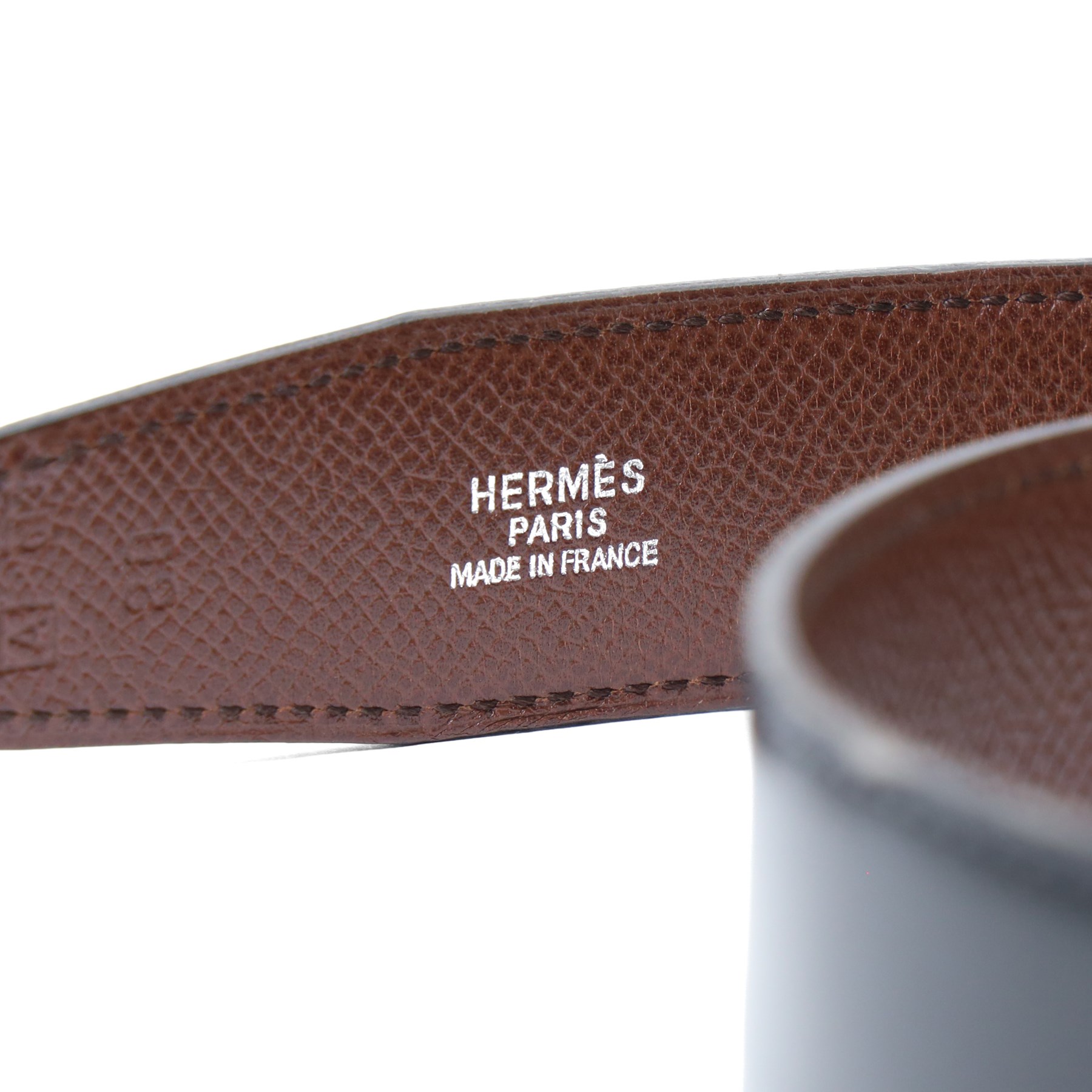 Hermès - vintage black leather belt, with silver-tone rectangular pin buckle and stitched edging, stamped HERMÈS; with additional Hermes reversible black and brown belt (no buckle), size 80