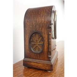  Late 19th century oak cased bracket clock, silvered Roman dial marked 'B. Mallinson & Co. Huddersfield', twin train movement chiming the quarter hours on four gongs, back plate inscribed 'Patent no. 25242/20', H31cm  