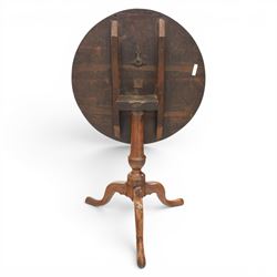 Georgian oak tripod table, plank top raised on a turned baluster column, raised on cabriole supports 