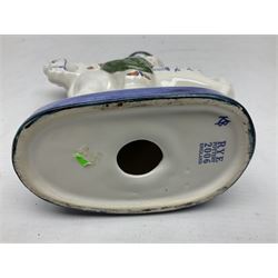 Rye pottery figure modelled as a lady upon a horse, with printed marks beneath, H19cm