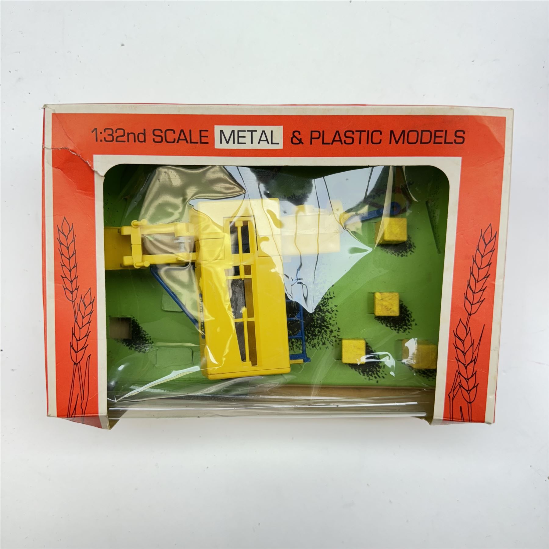 Britains 1:32 scale farm implements, vehicles and figures,  comprising 9563 Hay Baler, 9539 Seed Drill, 9534 Disc Harrow, 9537 Acrobat Rake, 9530 Three Furrow Plough, 9547 Horse Box with Horse, 9576 Farm Land Rover, 2078 male Rider with Horse, 9533 Roller, 9538 Vari-Spreader, 9536 Cultivator, three 1742 Hay Bales, 1740 Milk Churns and 1741 Sacks, all boxed, together with trees, walls, buildings and loose vehicles