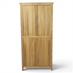 Light ash and oak open bookcase, fitted with five adjustable shelves