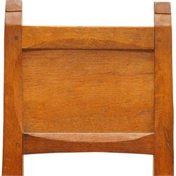 Gnomeman - set of six oak dining chairs, the adzed panelled backs with chamfered rails, over seats upholstered in tan leather, raised on chamfered and tapering square supports united by box stretchers, carved with gnome signature, by Thomas Whittaker, Littlebeck, Whitby