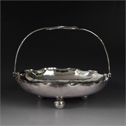 Chinese export silver swing handled basket, of circular for with crimped rim and knotted w...