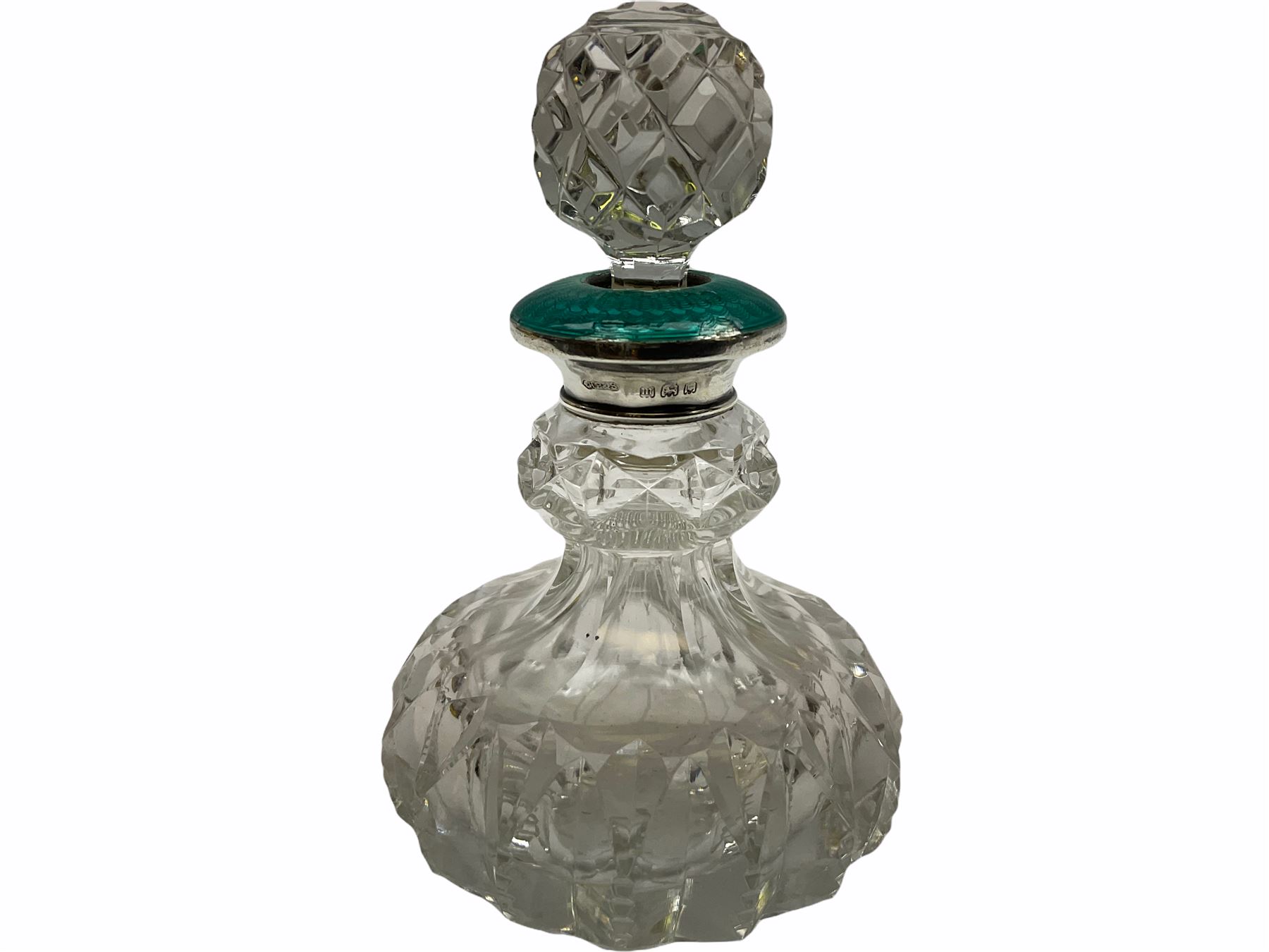 Cut glass perfume bottle of bellied form, the silver mounted cover with turquoise guilloche enamel top, hallmarked Henry Perkins & Sons, London 1927, together with a cut glass perfume bottle with silver mounted and yellow guilloche enamel lid, hallmarked Albert Carter, Birmingham 1950, Continental silver perfume bottle, of barrel form with embossed figural detail, stamped 930, scent bottle of bellied form with white metal foliate pierced overlay, amethyst glass scent bottle of flask form with foliate embossed white metal cover and suspension ring and chain, and three further examples, including one of ovoid form with painted decoration and silver cover, hallmarked for Birmingham.
