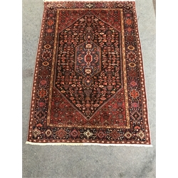 Hamadan red ground rug, repeating border (205cm x 140cm) and a Persian style matt (82cm x 57cm