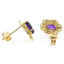 Pair of 9ct gold oval amethyst set ear-rings stamped 375