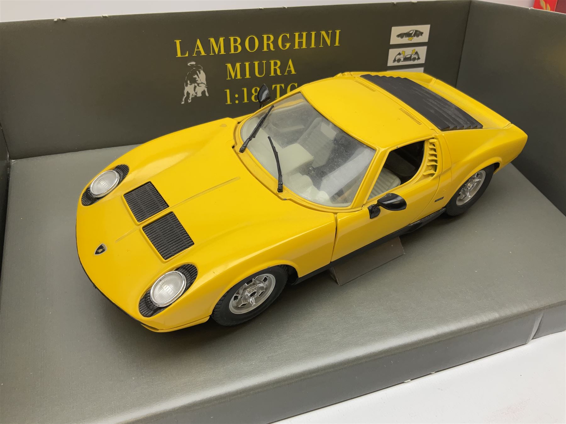 Polistil - four Tonka 1:16 scale models comprising Porsche 911 Cabriolet; MGA Twin Cam; Ferrari California; and Morgan Plus 8; and Polistil 1:18 scale  model Lamborghini Miura; all boxed (5)