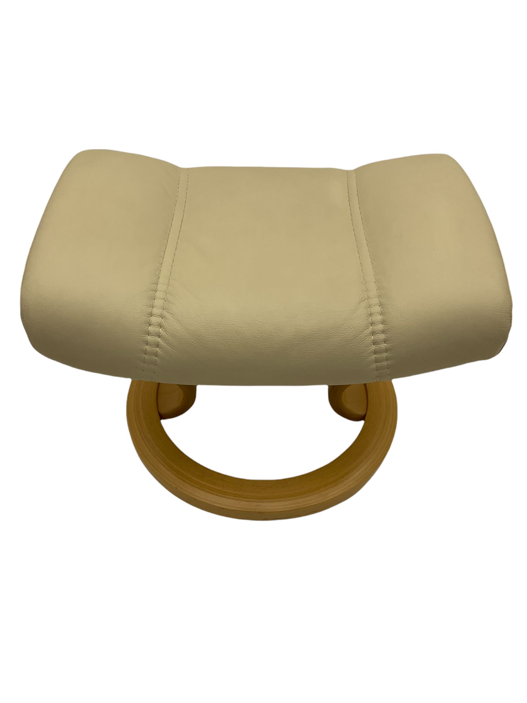 Ekornes - Stressless armchair upholstered in cream leather with matching footstool 