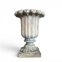 Cast stone tulip urn, petal rim with bell shaped bowl on squat base, stamped HGC; with associated plinth (2)