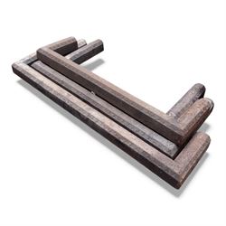 Two cast iron fire surrounds / inserts along with four metal surround pieces 