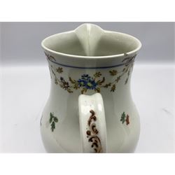 Large 18th century Bristol porcelain sparrow beak jug, circa 1770-1775, of baluster form with grooved strap handle, decorated with hand painted floral sprays and sprigs beneath a floral swag suspended from a blue band, with paper label beneath detailed Bayley Collection Bristol, H22cm
